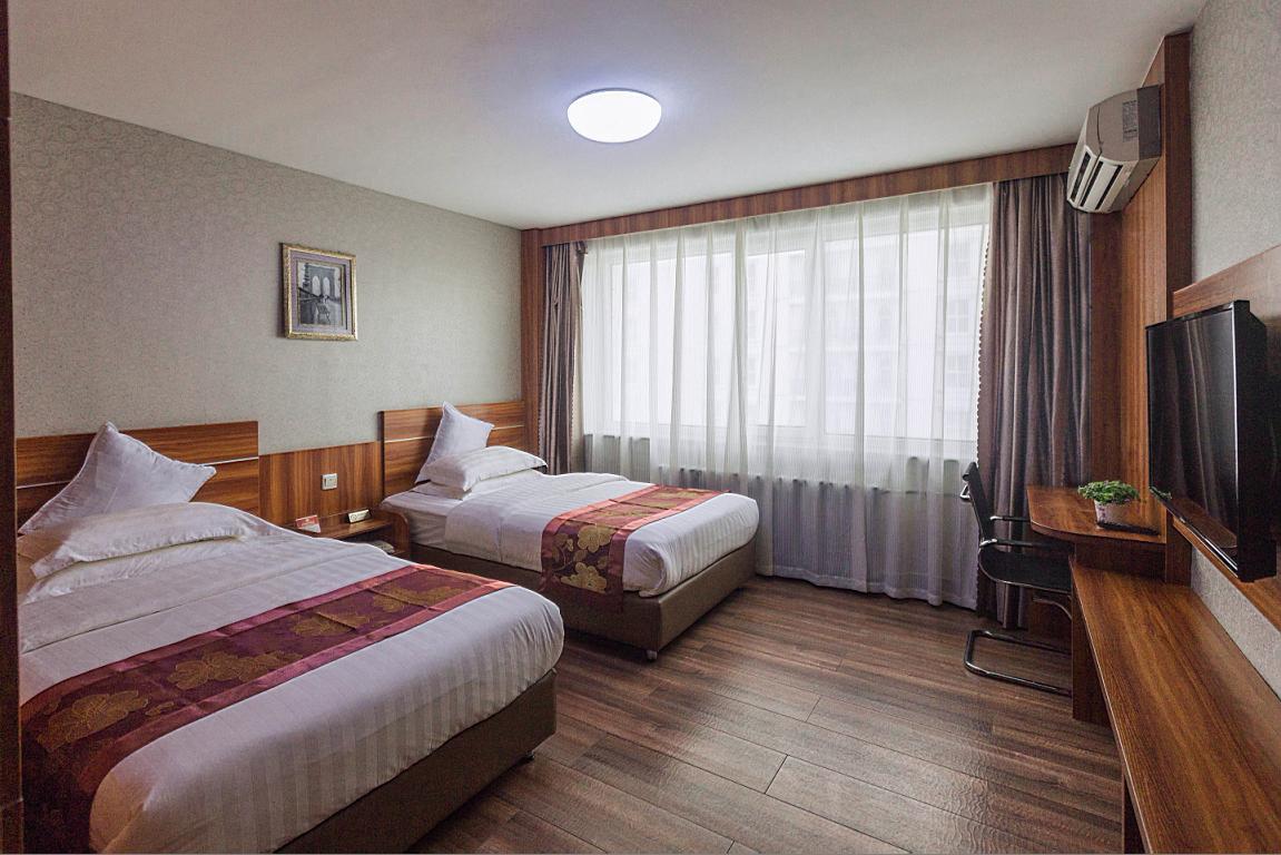 Beiguozhichun Business Hotel Manzhouli Bagian luar foto