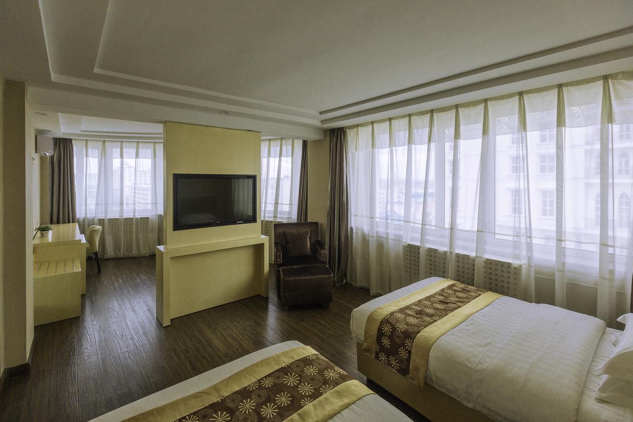 Beiguozhichun Business Hotel Manzhouli Bagian luar foto