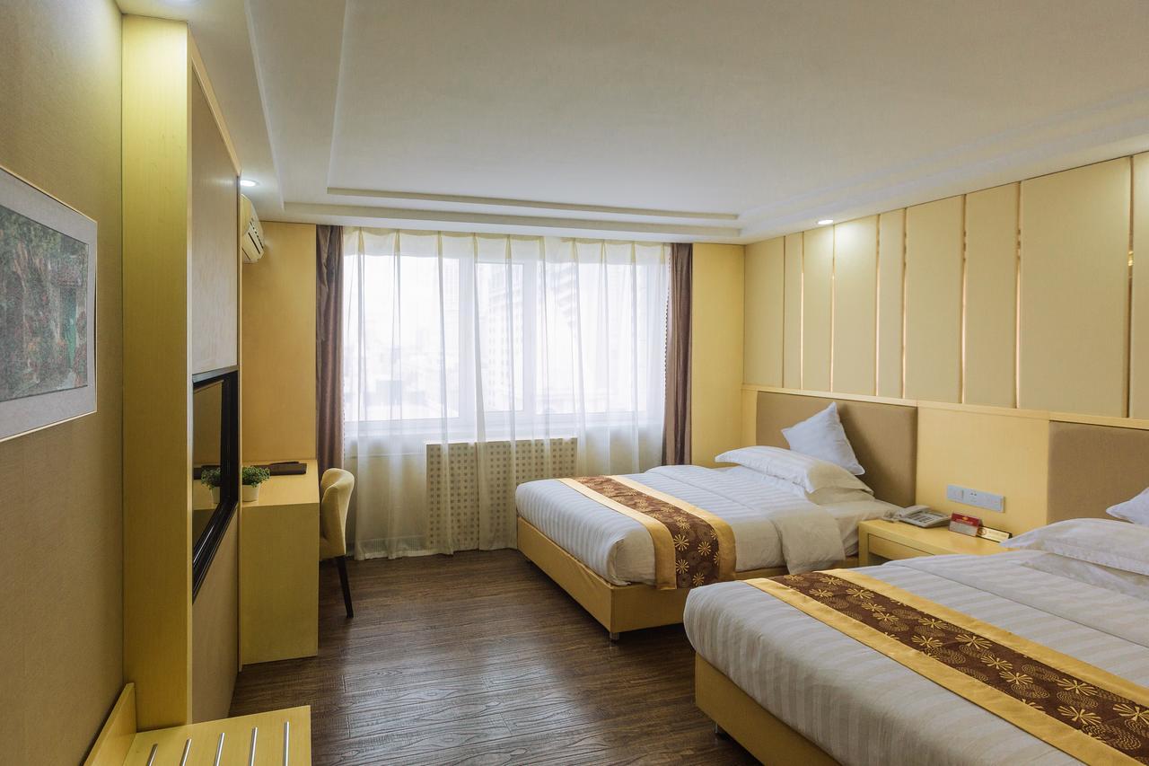 Beiguozhichun Business Hotel Manzhouli Bagian luar foto